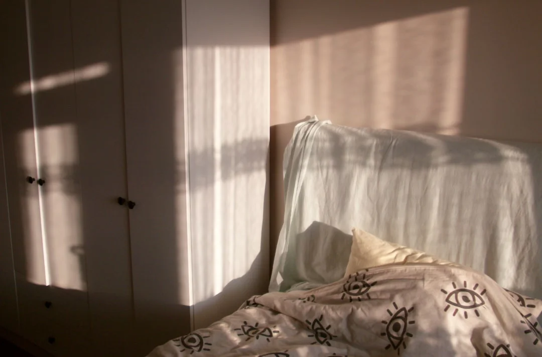 Quiet bedroom with warm, dimmed light in the evening