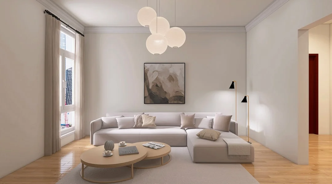 un salon avec un canapé et une table