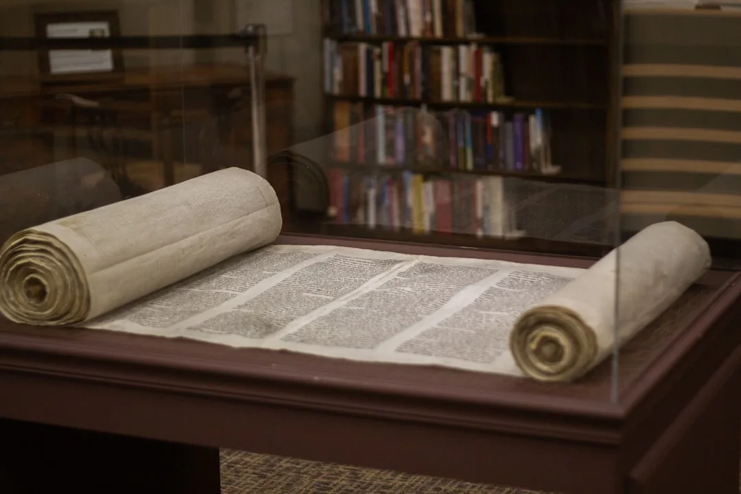 An ancient Sanskrit manuscript with handwritten characters on yellowed paper