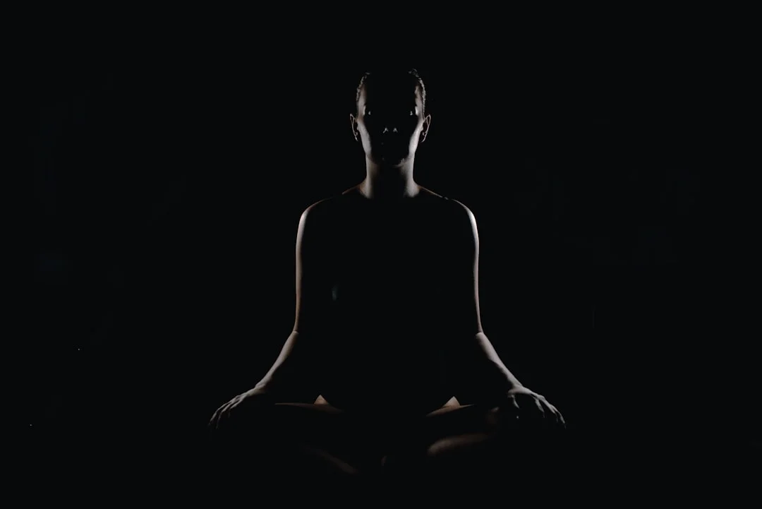 Woman practicing mindful movement - yoga as an example of a body-neutral approach to one's own body